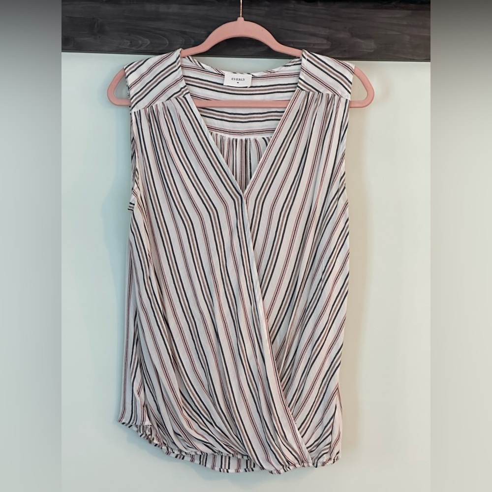 Sleeveless shirt, light, breathable fabric, great business builder piece